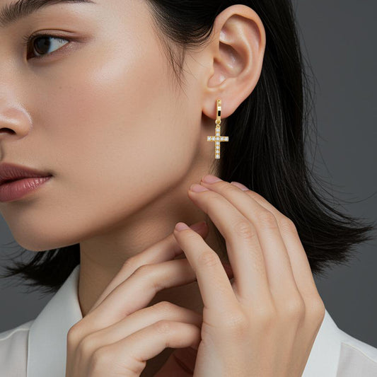Close-up of model wearing 14K Yellow Gold Classic Cross Hoop Earrings with Lab-Grown Diamonds