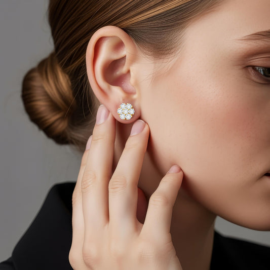 Angled close-up showing a model wearing 14k Yellow Gold Flower Cluster Lab-Grown Diamond Stud Earrings (Screw Back)
